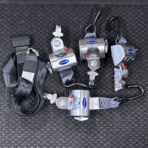 Straint wheelchair retractor - q'straint,
